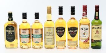 7 Flaschen Irish Whisky.