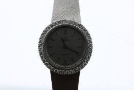 Omega. White gold ladies wrist watch with diamonds