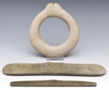 Columbia, Tairona, two fine stone winged breast ornaments and a stone circulair ornament, ca. 500 -