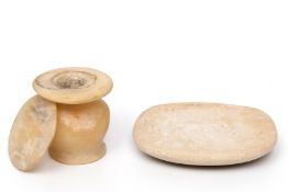 Egypt, an alabaster lidded kohl pot and an alabaster cosmetic palette, Middle Kingdom, ca. 1000 BCE