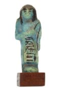 Egypt, a faience Ushabti, New Kingdom, ca. 1000 BCE.