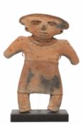 Venezuela, Trujillo Ateneo de Bocono, 500 - 1200 CE, a standing terracotta figure,