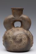 North Peru, Chavin, 700 - 100 BCE, a terracotta stirrup spout vessel,