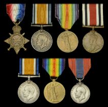 Four: Private R. M. Powell, Middlesex Regiment, later Royal Army Pay Corps 1914-15 Star...