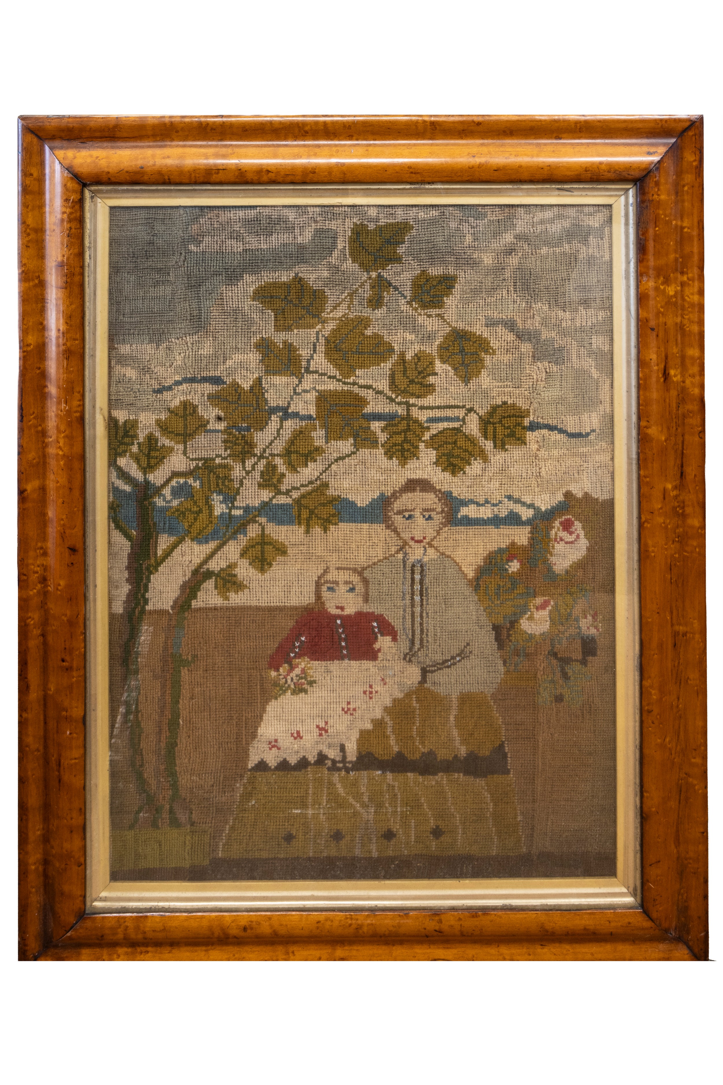 A GEORGIAN WOOL WORK PANEL CIRCA 1800 depicting a mother and child ...