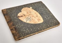 An elaborate manuscript Valentine's Day gift book recording a honeymoon to the 1904 World's Fair