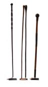 FOUR CARVED WOODEN WALKING STICKS, CONTEMPORARY