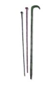 THREE CARVED STONE WALKING STICKS, CONTEMPORARY
