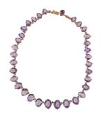 AN EARLY 20TH CENTURY AMETHYST NECKLACE