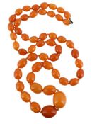 AN AMBER BEAD NECKLACE