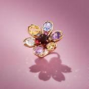 A MULTI COLOURED SAPPHIRE AND GEM SET FLOWER RING