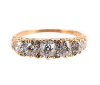 AN EARLY 20TH CENTURY FIVE STONE DIAMOND RING