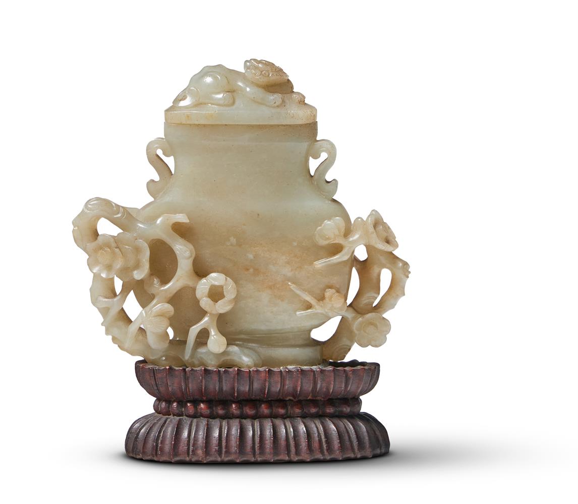 A CHINESE CELADON AND RUSSET JADE VASE AND COVER, 17TH CENTURY