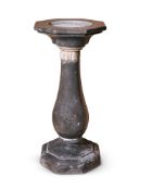 A GREY FOSSIL MARBLE AND WHITE MARBLE HEXAGONAL FONT