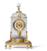 A CUT-GLASS AND GILT-METAL-MOUNTED TWO-TRAIN MANTEL CLOCK, FRENCH, CIRCA 1820