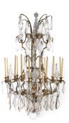 A BRASS AND CUT GLASS TWELVE LIGHT CHANDELIER, 20TH CENTURY
