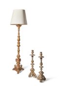 A PAIR OF ITALIAN GILTWOOD ALTAR CANDLESTICKS, LATE 18TH/EARLY 19TH CENTURY