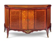 Y A DUTCH ORMOLU-MOUNTED SATINWOOD, ROSEWOOD, AMARANTH, MARQUETRY AND PARQUETRY SERPENTINE COMMODE