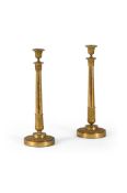 A PAIR OF EMPIRE REVIVAL ORMOLU TALL CANDLESTICKS, EARLY 20TH CENTURY
