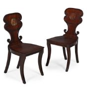 A PAIR OF REGENCY MAHOGANY HALL CHAIRS, CIRCA 1820