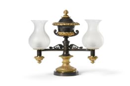 A BRONZE AND GILT METAL TWIN BRANCH TABLE LAMP, IN EARLY 19TH CENTURY STYLE
