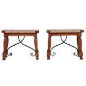 A SMALL PAIR OF CARVED BEECH AND RUSH SEATED STOOLS, IN SPANISH 17TH CENTURY STYLE