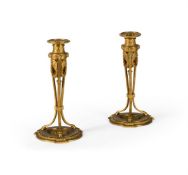 A PAIR OF TRIFORM ORMOLU CANDLESTICKS CAST BY BARBEDIENNE, 1870-1890