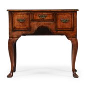 A GEORGE II WALNUT LOWBOY, CIRCA 1740