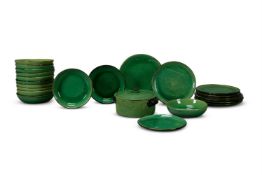 A PART DINNER SERVICE OF MOURRE & MILON GREEN GLAZED POTTERY, FRENCH, 20TH CENTURY