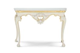 A CREAM AND PARCEL GILT SERPENTINE SIDE TABLE, EARLY 20TH CENTURY
