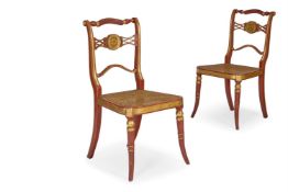 A PAIR OF REGENCY LATER RED PAINTED AND PARCEL-GILT SIDE CHAIRS, EARLY 19TH CENTURY