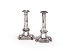 A PAIR OF QUEEN ANNE SILVER CANDLESTICKS