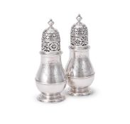 A PAIR OF QUEEN ANNE SILVER BRITANNIA STANDARD BALUSTER CASTERS