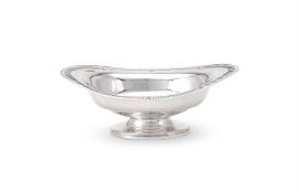 AN EDWARDIAN SILVER OVAL PEDESTAL BOWL