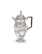 A CONTINENTAL SILVER HOT WATER JUG