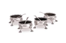 A SET OF FOUR GEORGE III SILVER OVAL BALUSTER SALTS