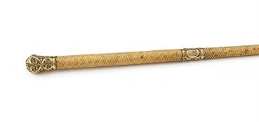 A GOLD MOUNTED RIDING CROP