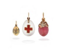 ALEXANDER TILLANDER, THREE EGG PENDANTS