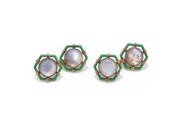 FABERGÉ, A SET OF FOUR MOONSTONE AND ENAMEL BUTTONS
