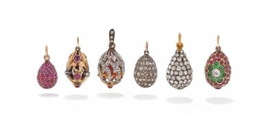 A GROUP OF GEM SET EGG PENDANTS