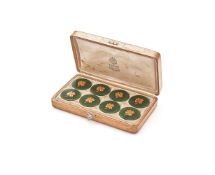 FABERGÉ, A BOXED SET OF EIGHT NEPHRITE AND GOLD GAMING TOKENS