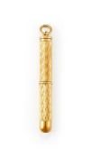 CARTIER, AN 18 CARAT GOLD CIGAR PUNCHER