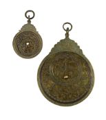 TWO DECORATIVE ISLAMIC BRASS ASTROLABES