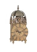 A BRASS QUARTER-CHIMING LANTERN CLOCK