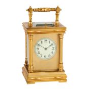 A FRENCH GILT BRASS CARRIAGE CLOCK WITH PUSH-BUTTON REPEAT
