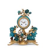 A FRENCH LOUIS XV STYLE TURQUOISE GLAZED PORCELAIN MOUNTED ORMOLU MANTEL CLOCK