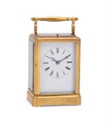 A FRENCH GILT BRASS CARRIAGE TIMEPIECE WITH PUSH-BUTTON REPEAT AND ONE-PIECE CASE