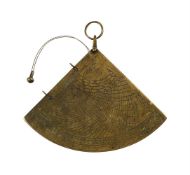 AN ISLAMIC ENGRAVED BRASS ASTROLABIC QUADRANT