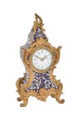 A FRENCH GILT BRASS AND CHAMPLEVE ENAMELLED SMALL MANTEL TIMEPIECE IN THE LOUIS XV TASTE