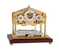 A LACQUERED BRASS MINIATURE CONGREVE-TYPE ROLLING BALL TIMEPIECE